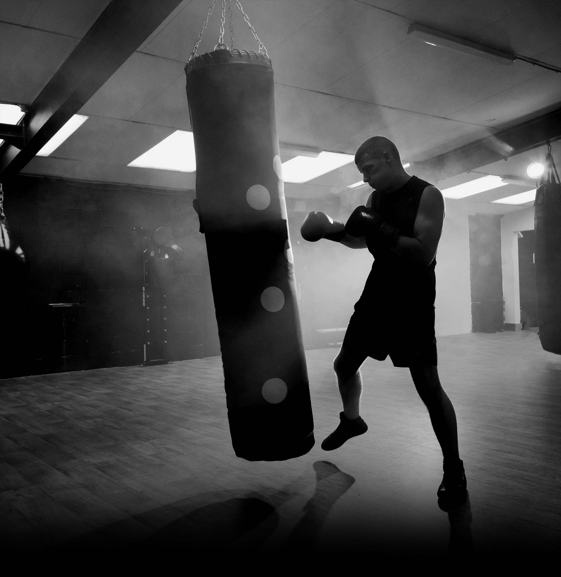 man hitting a smart punching bag